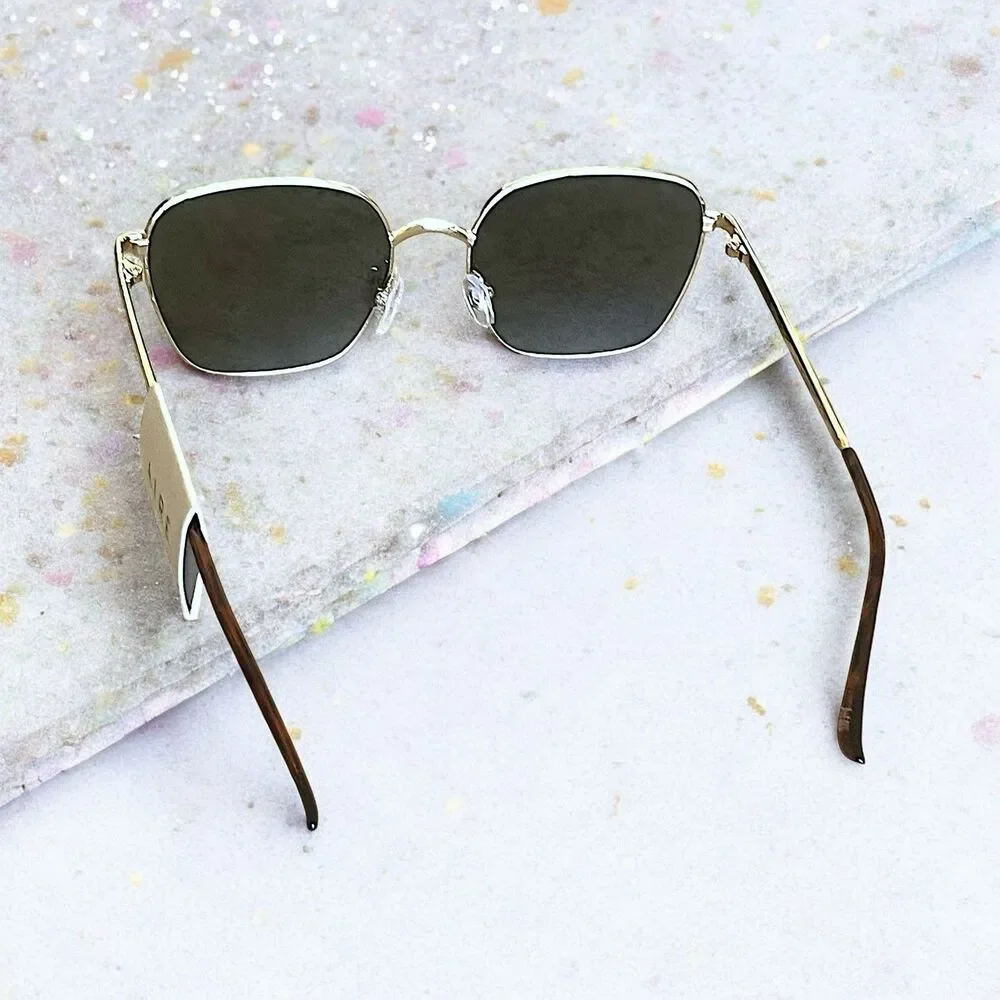 AIRE Women's Spiral Sunglasses in Gold Brand New With Tags